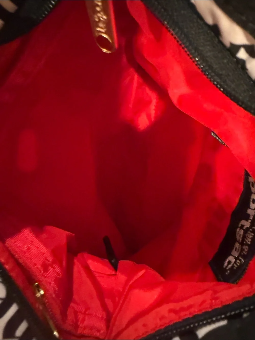 LeSportsac Black-and-Red Gwen Stefani Labeled Bag